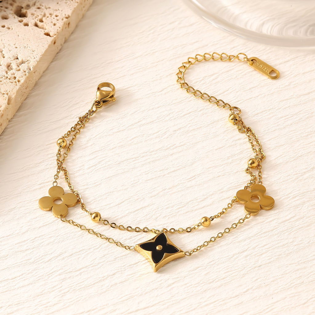 Four-Leaf Clover Titanium Steel Bracelet — 18K Gold Plated, INS Fashion, Fade-Resistant