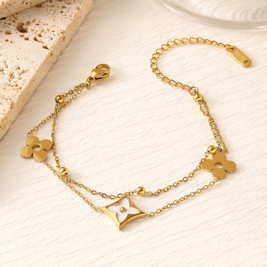 Four-Leaf Clover Titanium Steel Bracelet — 18K Gold Plated, INS Fashion, Fade-Resistant