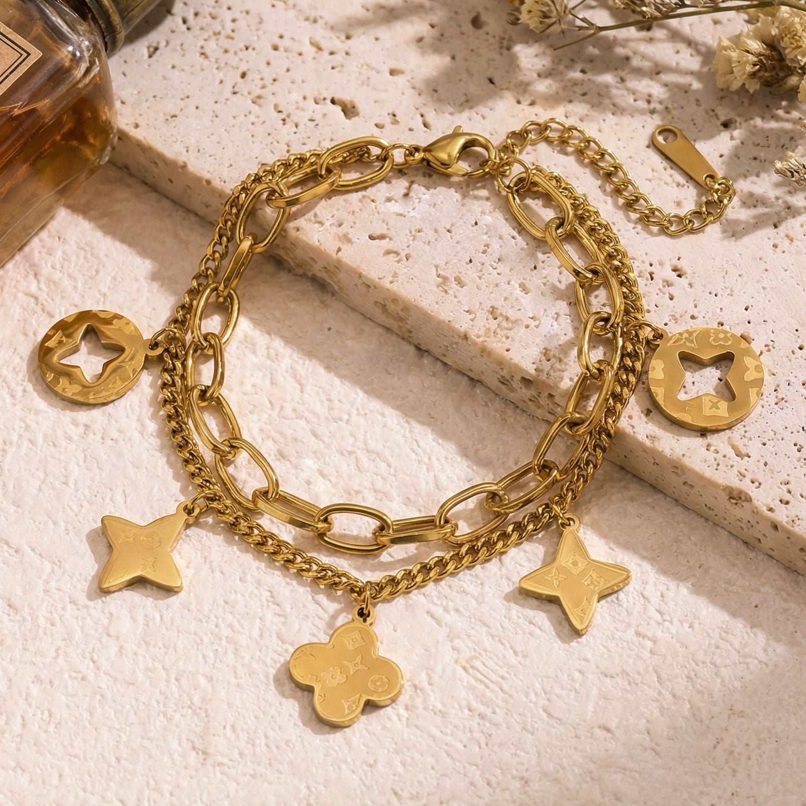 Gold Openwork Four-Leaf Clover Tassel Bracelet — Titanium Steel, 18K Gold, Light Luxury