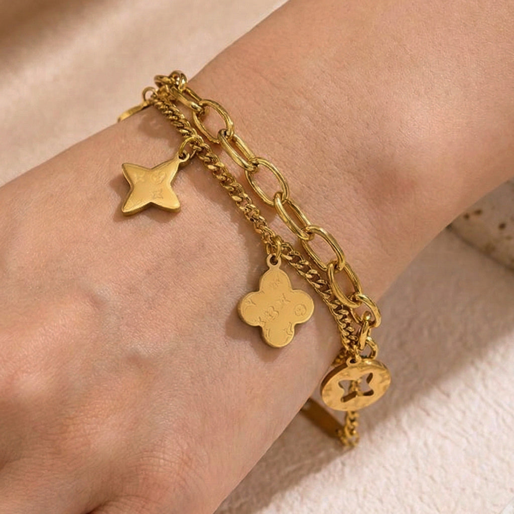 Gold Openwork Four-Leaf Clover Tassel Bracelet — Titanium Steel, 18K Gold, Light Luxury