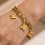 Gold Openwork Four-Leaf Clover Tassel Bracelet — Titanium Steel, 18K Gold, Light Luxury
