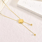 Lucky Four-Leaf Clover Tassel Titanium Steel Necklace — 18K Gold Plated, Fade-Resistant