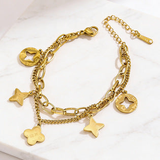 Gold Openwork Four-Leaf Clover Tassel Bracelet — Titanium Steel, 18K Gold, Light Luxury