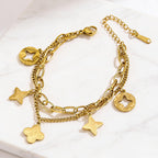 Gold Openwork Four-Leaf Clover Tassel Bracelet — Titanium Steel, 18K Gold, Light Luxury