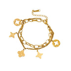 Gold Openwork Four-Leaf Clover Tassel Bracelet — Titanium Steel, 18K Gold, Light Luxury