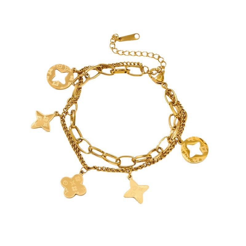 Gold Openwork Four-Leaf Clover Tassel Bracelet — Titanium Steel, 18K Gold, Light Luxury