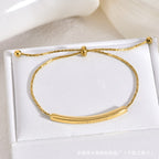 Minimalist Titanium Steel Gold Bent Tube Sliding Bracelet — Adjustable