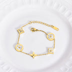 Four-Leaf Clover White Shell Bracelet — 18K Gold Plated Titanium Steel